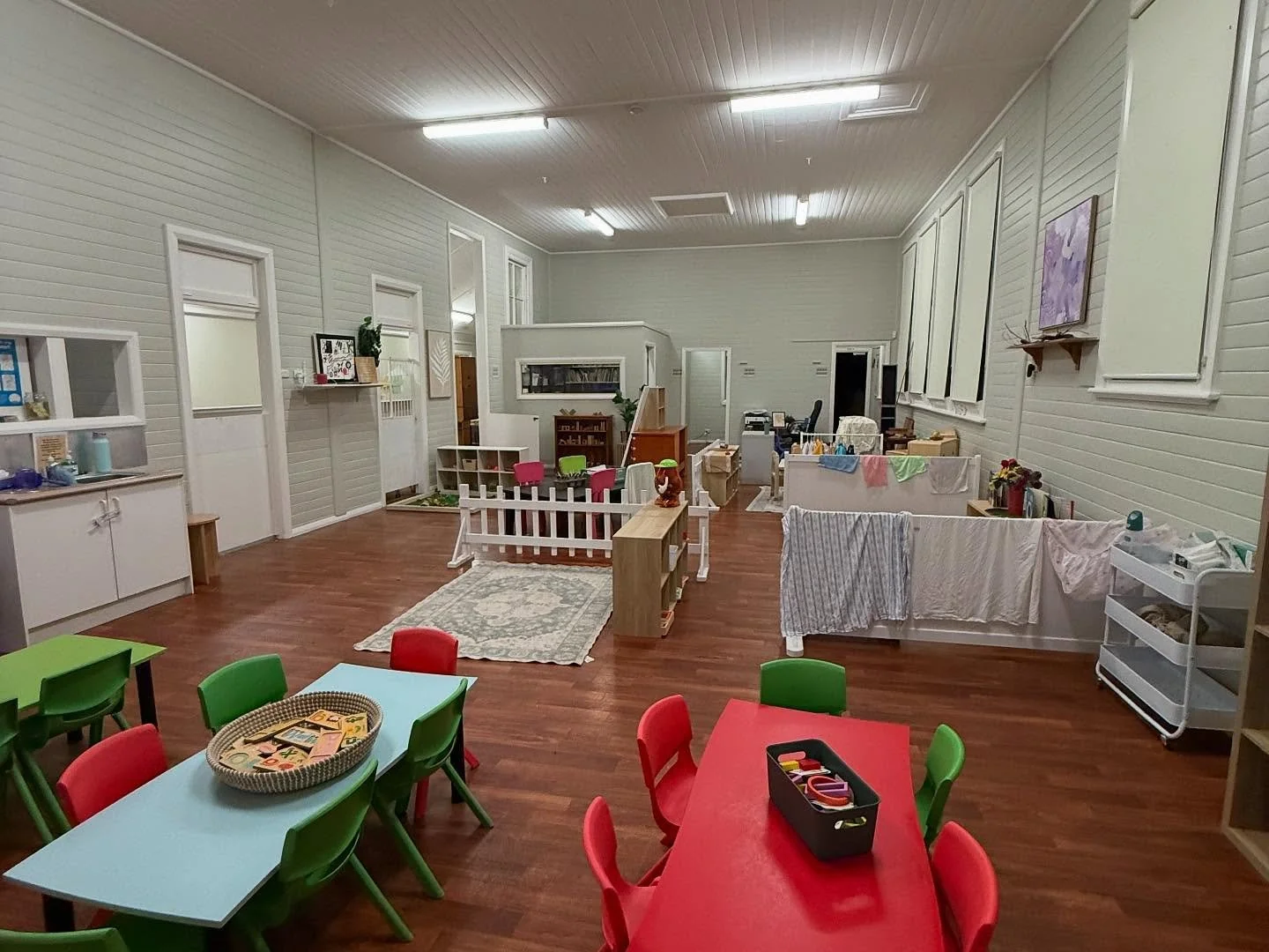 A childcare hall with freshly painted walls and VJ panelling