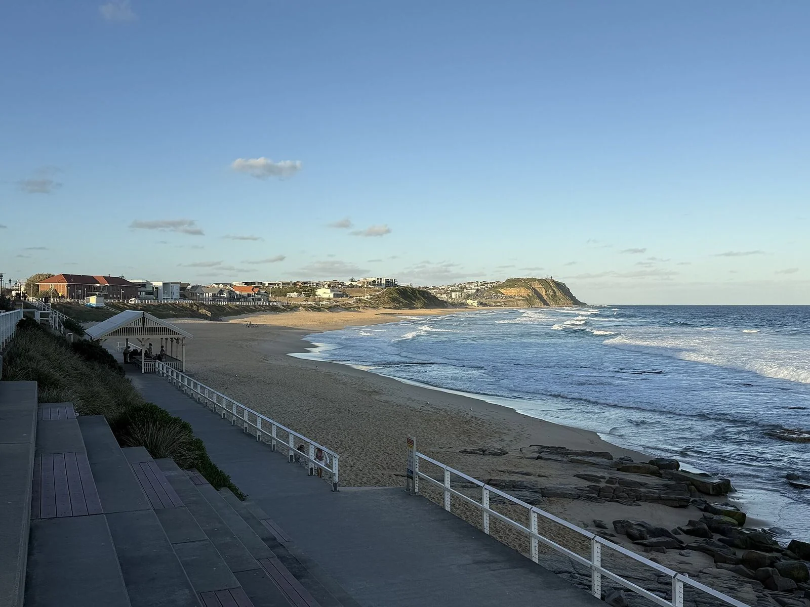 Merewether Beach on a summer afternoon, surfers in the water
