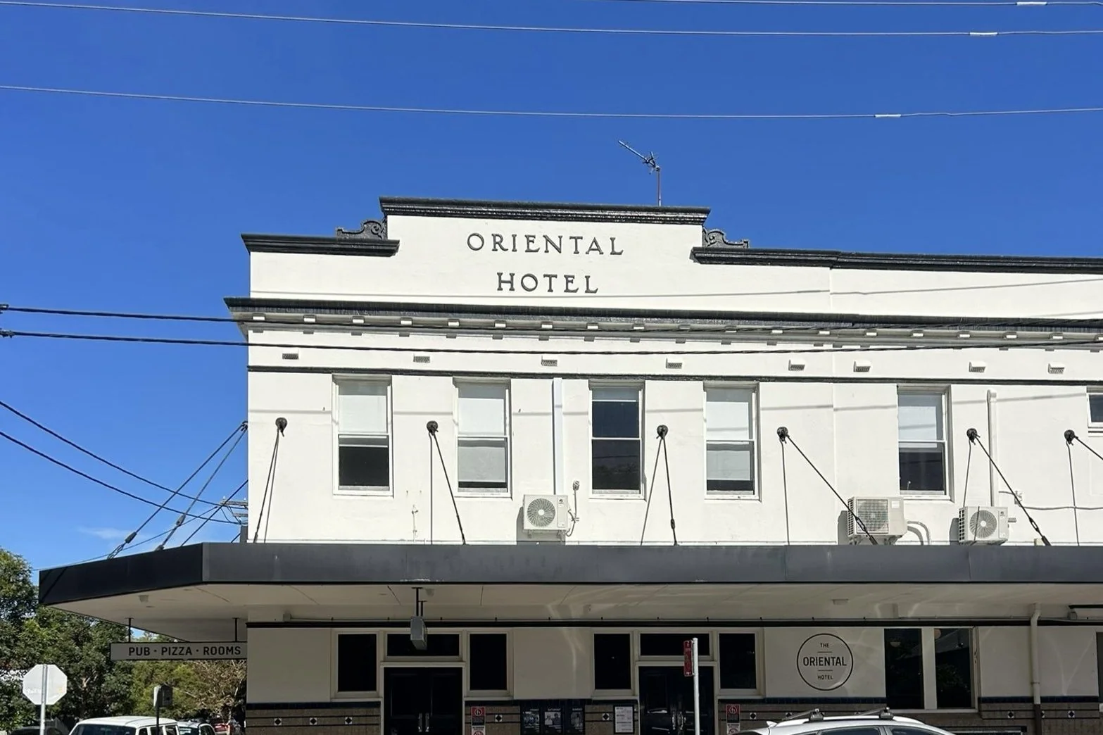 The white two-storey Oriental Hotel on a Cooks Hill corner